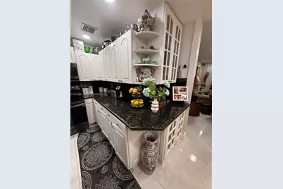 4100 Crystal Lake Dr #111, Deerfield Beach, FL 33064 - Photo 1