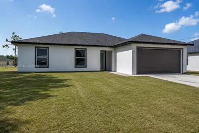 702 Carbon St, Lehigh Acres, FL 33974 - Photo 1