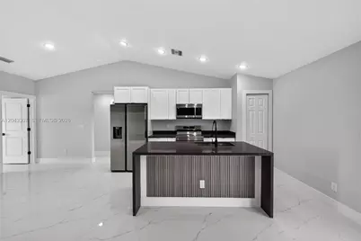 702 Carbon St, Lehigh Acres, FL 33974 - Photo 12