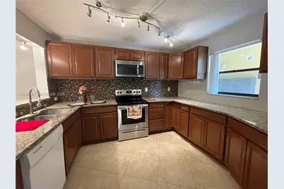 9044 NW 28th Dr #3-106, Coral Springs, FL 33065 - Photo 1