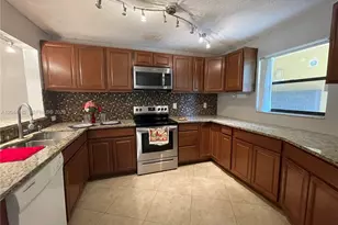 9044 NW 28th Dr, Coral Springs, FL 33065 - Photo 1