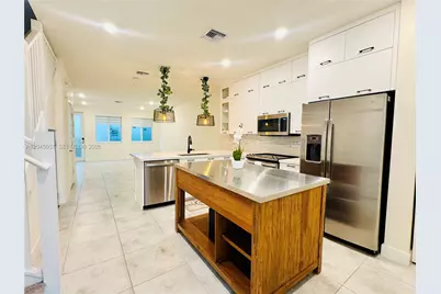 10295 NW 64th Ter #104, Doral, FL 33178 - Photo 2