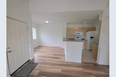 8070 N Nob Hill Rd #208, Tamarac, FL 33321 - Photo 4