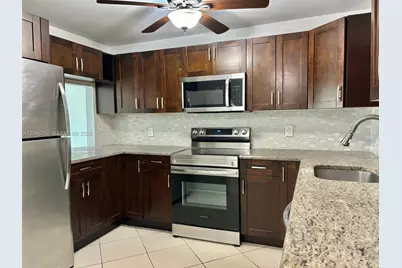 9411 Evergreen Pl #303, Davie, FL 33324 - Photo 1