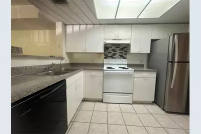 5011 Wiles Rd #207, Coconut Creek, FL 33073 - Photo 1