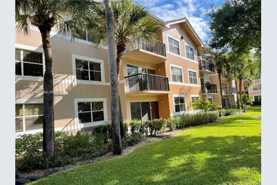 9033 Wiles Rd #206, Coral Springs, FL 33067 - Photo 2