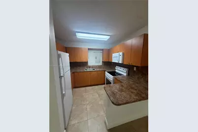 1650 W 44th Pl #119, Hialeah, FL 33012 - Photo 2