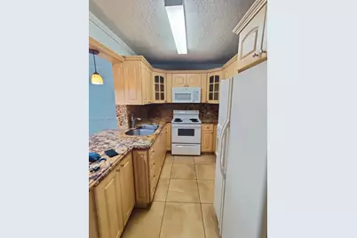 5705 W 20th Ave #215, Hialeah, FL 33012 - Photo 2