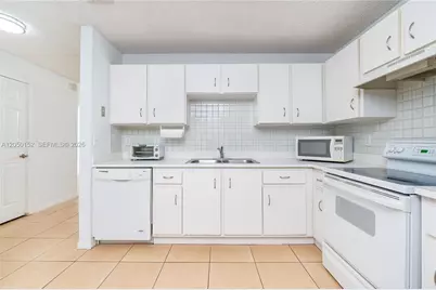 3877 NW 122nd Ter #1-L, Sunrise, FL 33323 - Photo 6