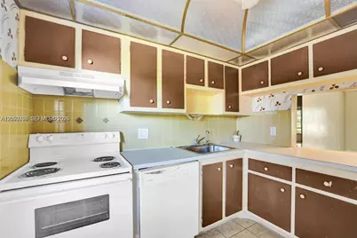 1030 Country Club Dr #405, Margate, FL 33063 - Photo 6