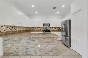 582 NE 207th St, Miami, FL 33179 - Photo 12