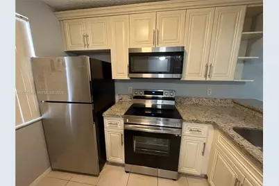 2740 Forest Hills Blvd #202, Coral Springs, FL 33065 - Photo 1