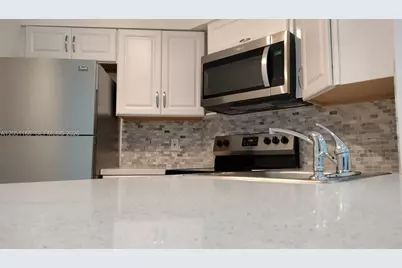 212 Lake Pointe Dr #307, Oakland Park, FL 33309 - Photo 2