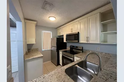 2740 Forest Hills Blvd #202, Coral Springs, FL 33065 - Photo 8