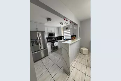 2760 W 63rd Pl #106-23, Hialeah, FL 33016 - Photo 6