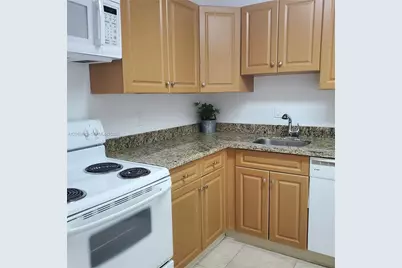 5112 NW 79th Ave #203, Doral, FL 33166 - Photo 1