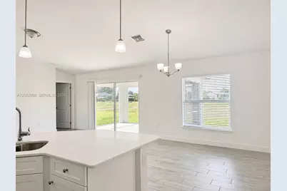 2711 20th Street SW #2711, Lehigh Acres, FL 33976 - Photo 2