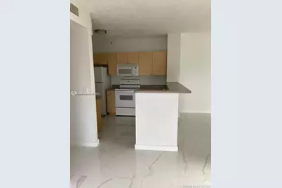 7980 N Nob Hill Rd #102, Tamarac, FL 33321 - Photo 4