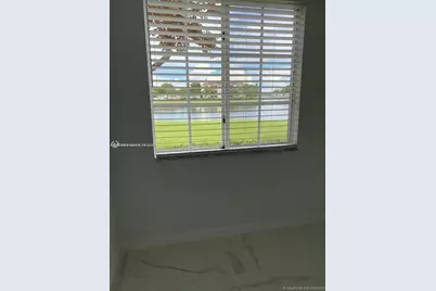7980 N Nob Hill Rd #102, Tamarac, FL 33321 - Photo 6