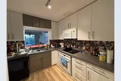 3660 NE 166th St #415, North Miami Beach, FL 33160 - Photo 8