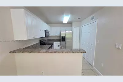 11401 NW 89th St #214, Doral, FL 33178 - Photo 2
