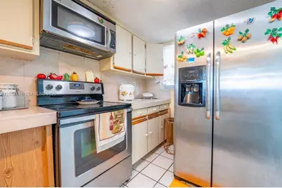 9917 W Okeechobee Rd #3-306, Hialeah Gardens, FL 33016 - Photo 16