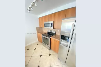 5880 W Sample Rd #308, Coral Springs, FL 33067 - Photo 18