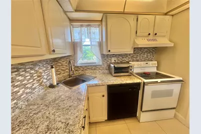 8900 Washington Blvd #409, Pembroke Pines, FL 33025 - Photo 12
