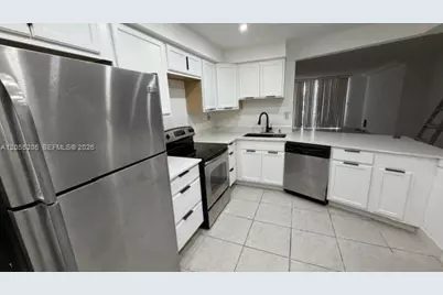 1660 NE 191st St #110-1, Miami, FL 33179 - Photo 2
