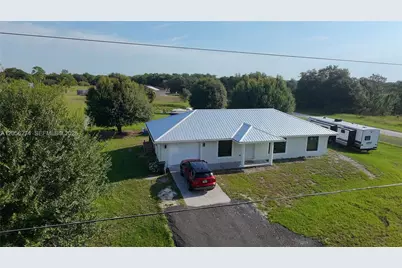 369 Horse Club Ave, Other City - In The State Of Florida, FL 33440 - Photo 2