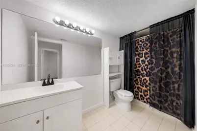 4025 W McNab Rd #E107, Pompano Beach, FL 33069 - Photo 14