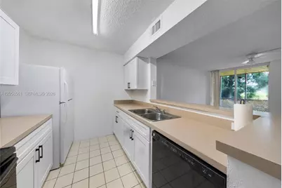 4025 W McNab Rd #E107, Pompano Beach, FL 33069 - Photo 16