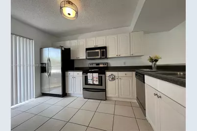 895 Crystal Lake Dr #103, Deerfield Beach, FL 33064 - Photo 2