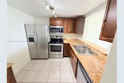 496 NW 165th St Rd #D-409, Miami, FL 33169 - Photo 6