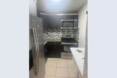 6095 W 18th Ave #S106, Hialeah, FL 33012 - Photo 1