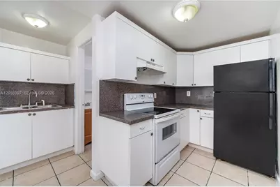 6980 NW 186th St #3-128A, Hialeah, FL 33015 - Photo 2