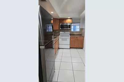 702 NW 87th Ave #309, Miami, FL 33172 - Photo 4