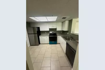 5005 Wiles Rd #102, Coconut Creek, FL 33073 - Photo 4