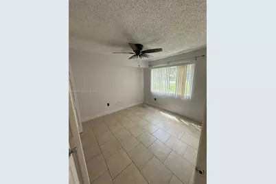 5005 Wiles Rd #102, Coconut Creek, FL 33073 - Photo 14