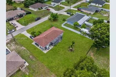909 Sally Ave NE, Lehigh Acres, FL 33971 - Photo 6