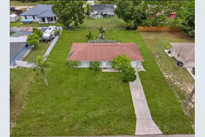 909 Sally Ave NE, Lehigh Acres, FL 33971 - Photo 8