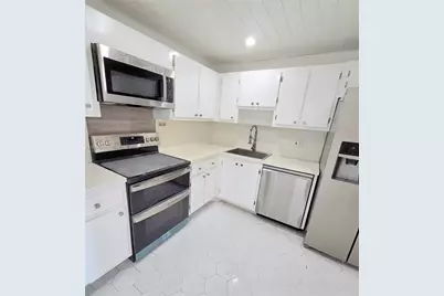 4030 W Palm Aire Dr #407, Pompano Beach, FL 33069 - Photo 2