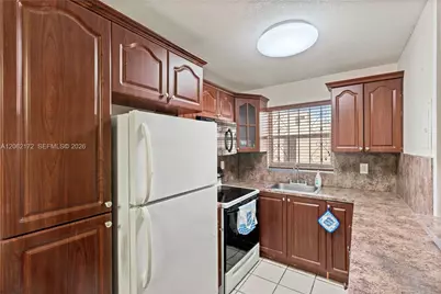 1855 W 60th St #407, Hialeah, FL 33012 - Photo 6