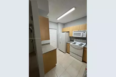 8020 N Nob Hill Rd #102, Tamarac, FL 33321 - Photo 1