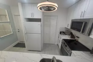 300 Golden Isles Dr, Hallandale Beach, FL 33009 - Photo 10