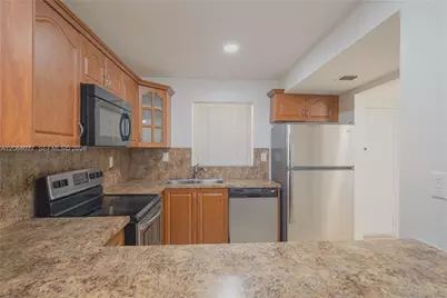 2830 Riverside Dr #107-3, Coral Springs, FL 33065 - Photo 4