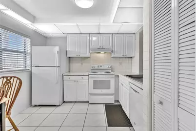 8852 W McNab Rd #203, Tamarac, FL 33321 - Photo 10