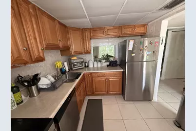 1055 Country Club Dr #402, Margate, FL 33063 - Photo 6