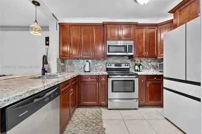 3007 N Oakland Forest Dr #107, Oakland Park, FL 33309 - Photo 2