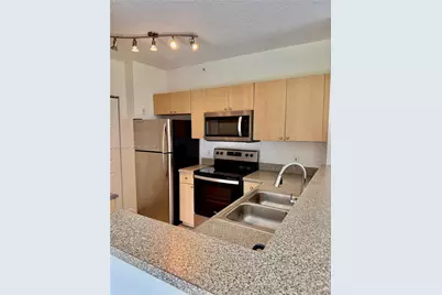 8010 N Nob Hill Rd #102, Tamarac, FL 33321 - Photo 4